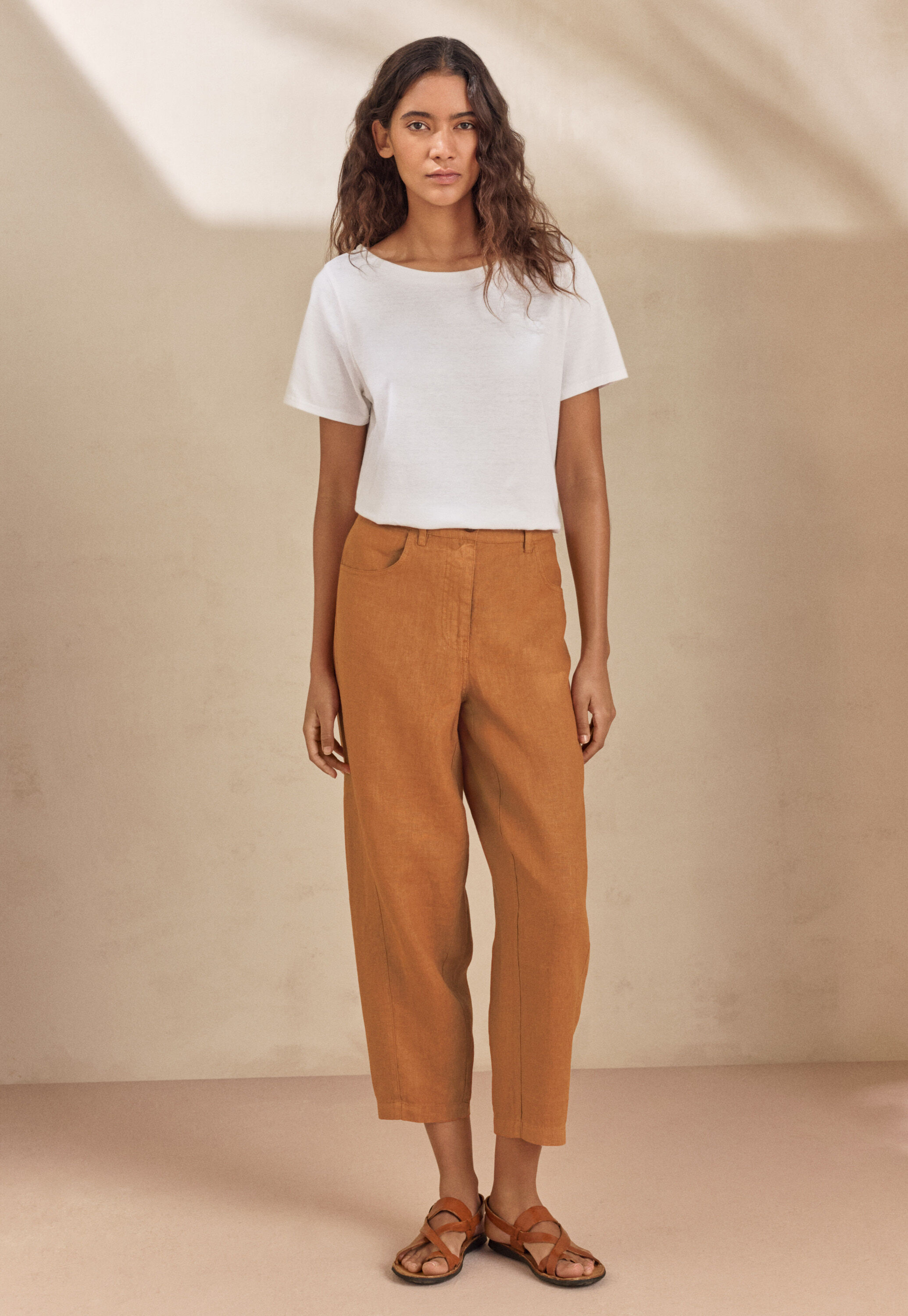 Curved-leg trousers