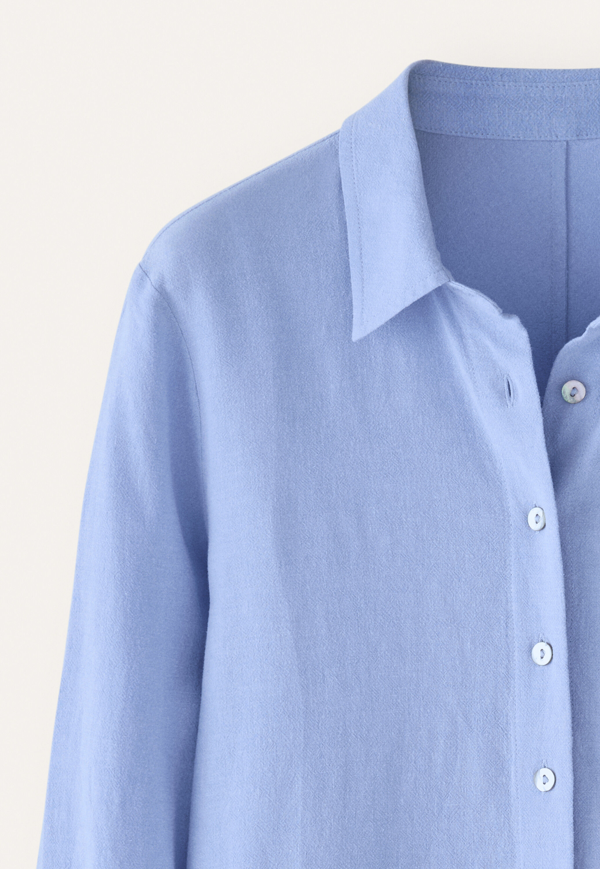 Curved-sleeve blouse