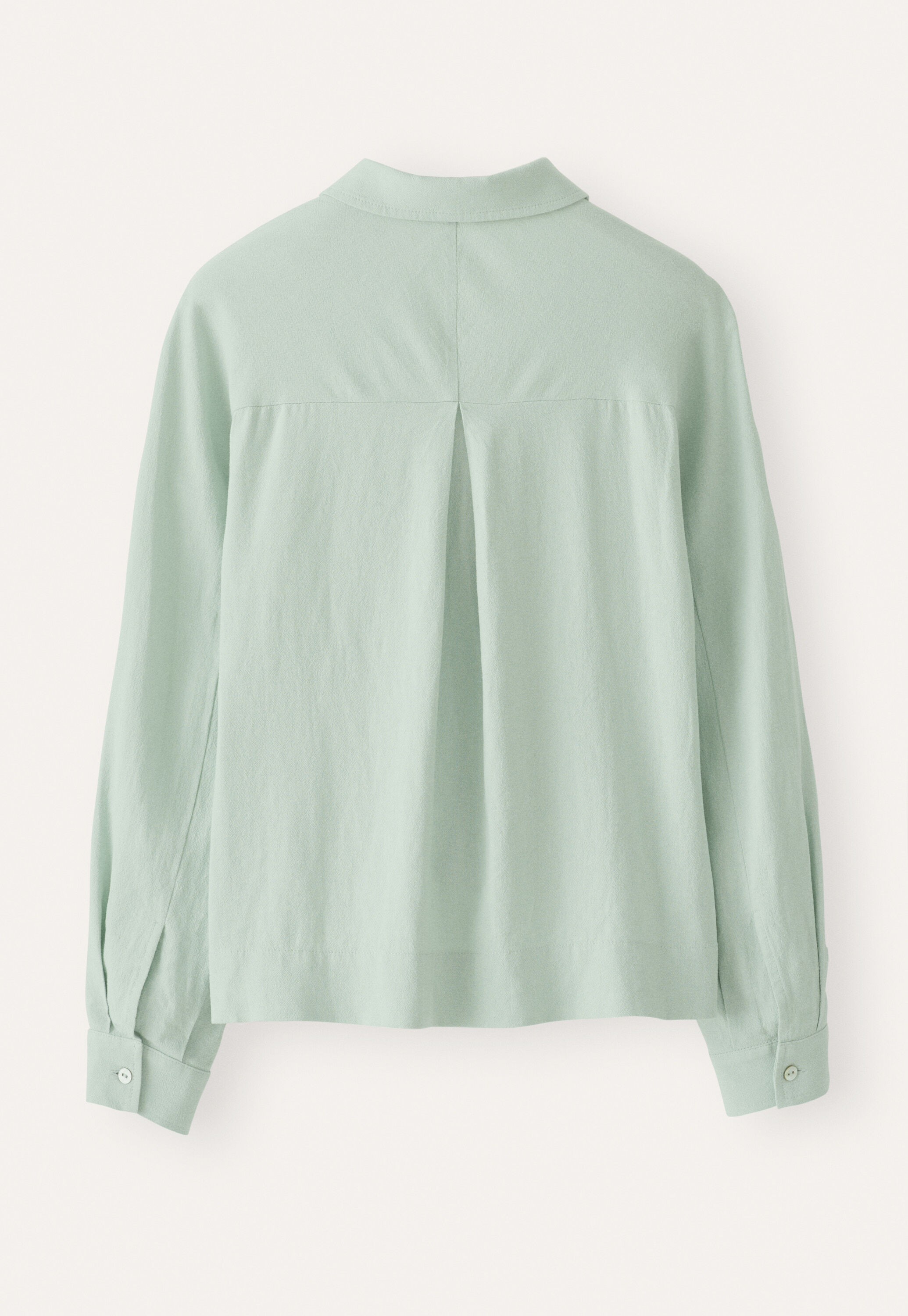 Curved-sleeve blouse