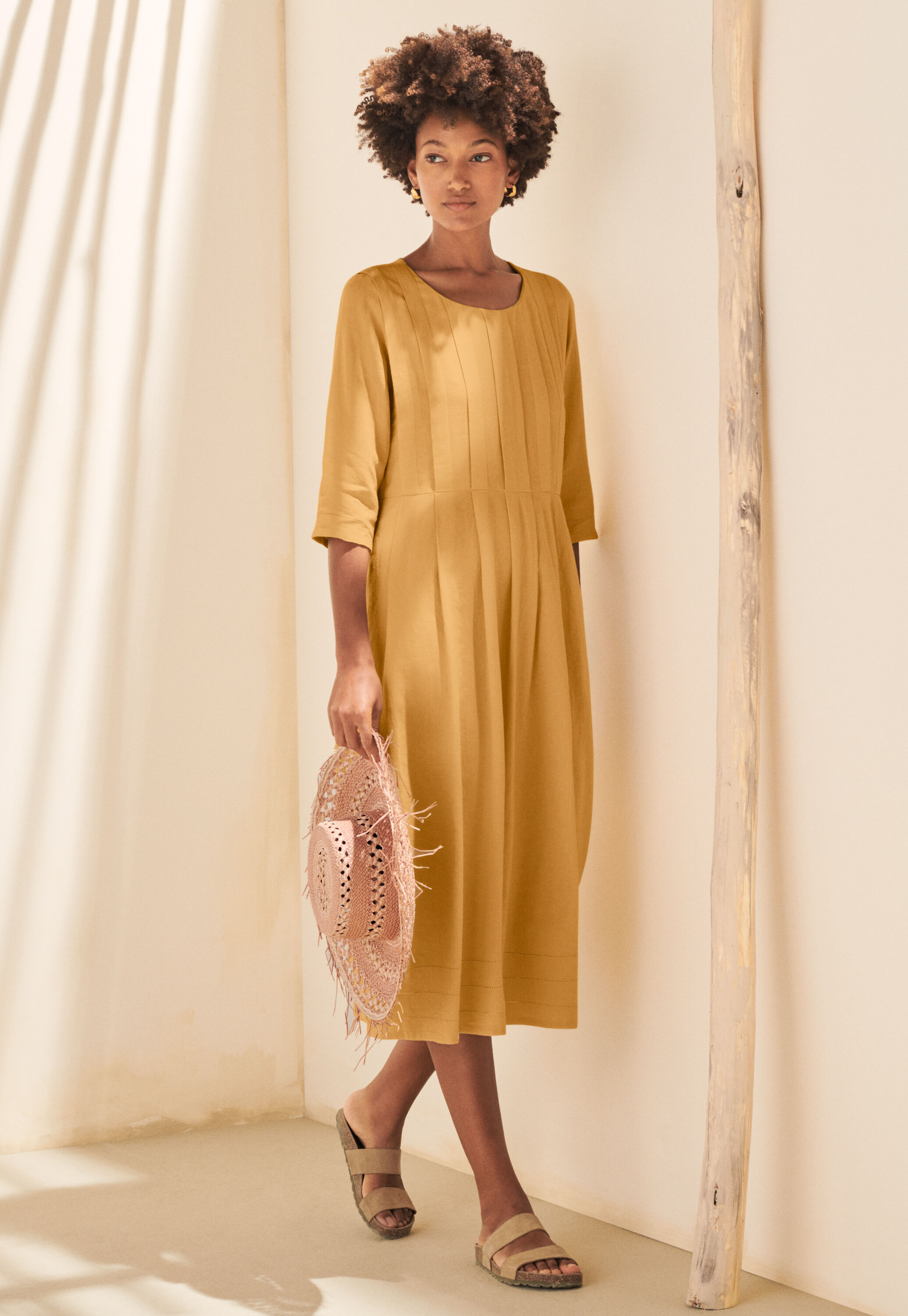 Curved-sleeve blouse