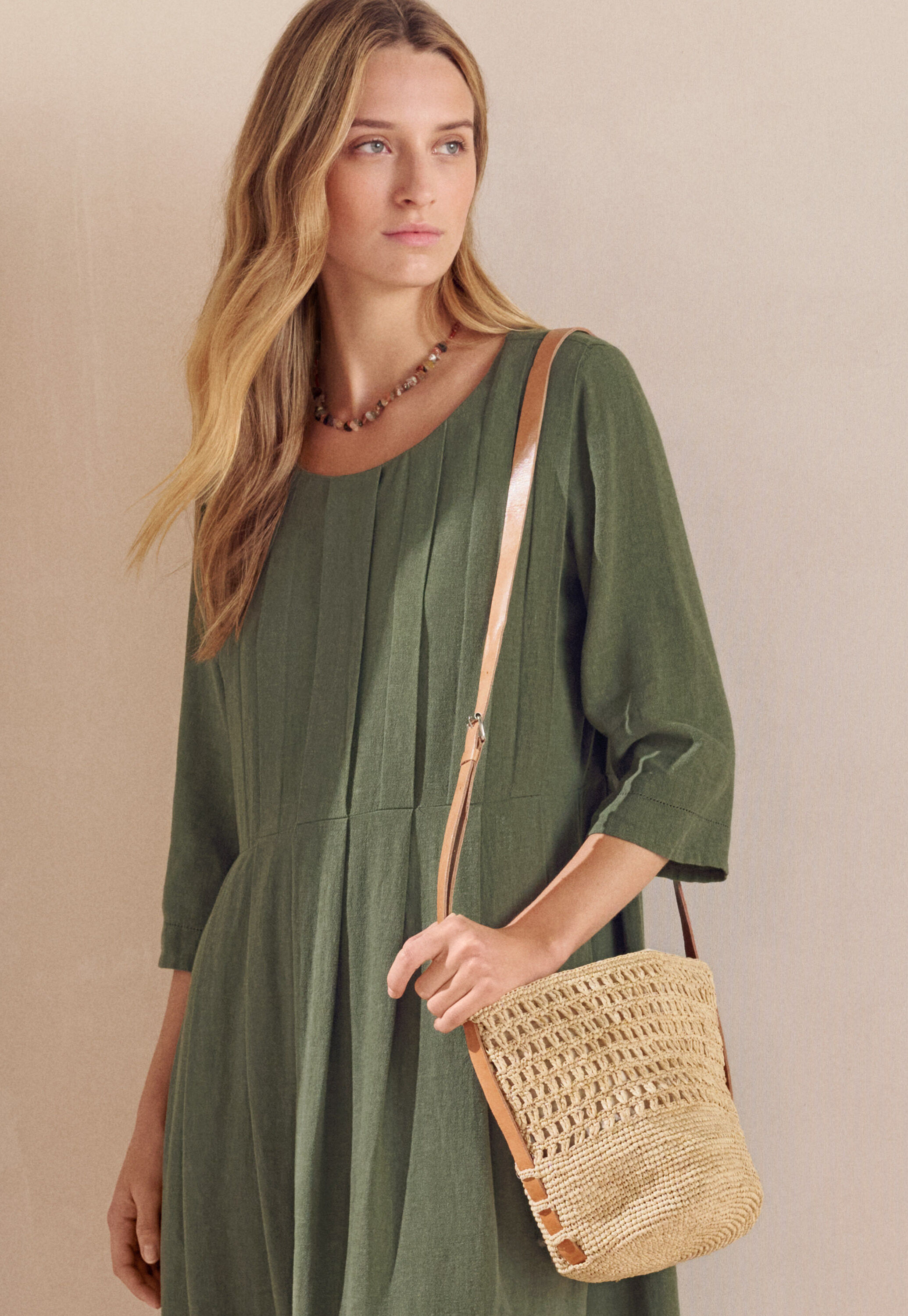 Curved-sleeve blouse