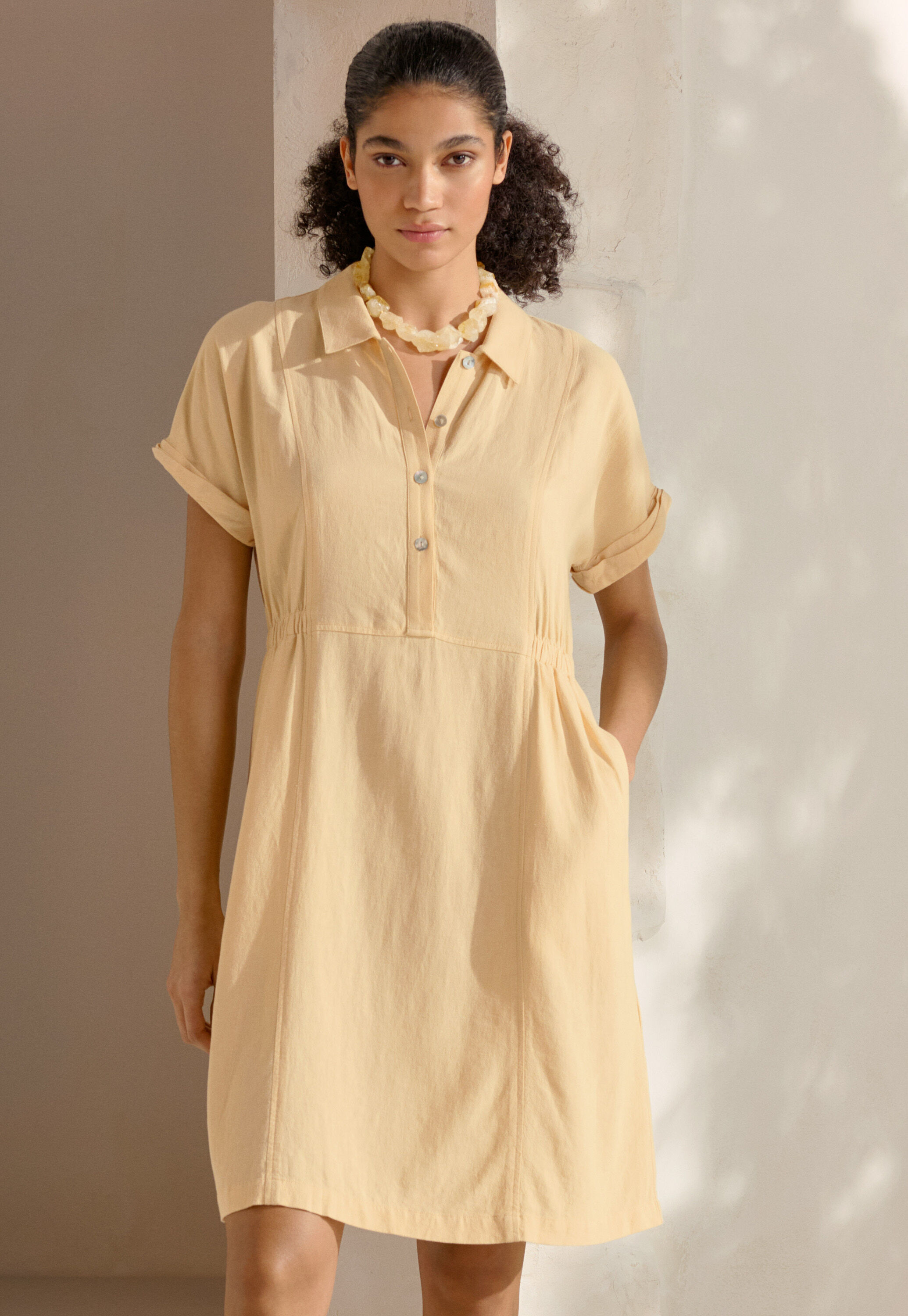 Curved-sleeve blouse