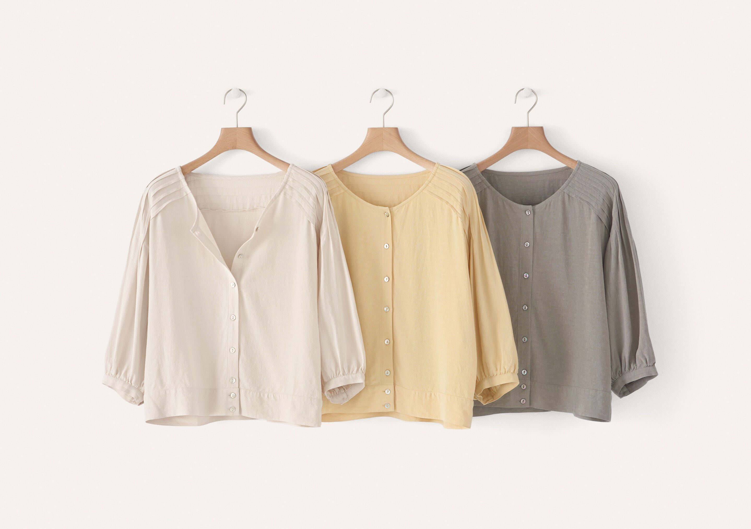 Curved-sleeve blouse