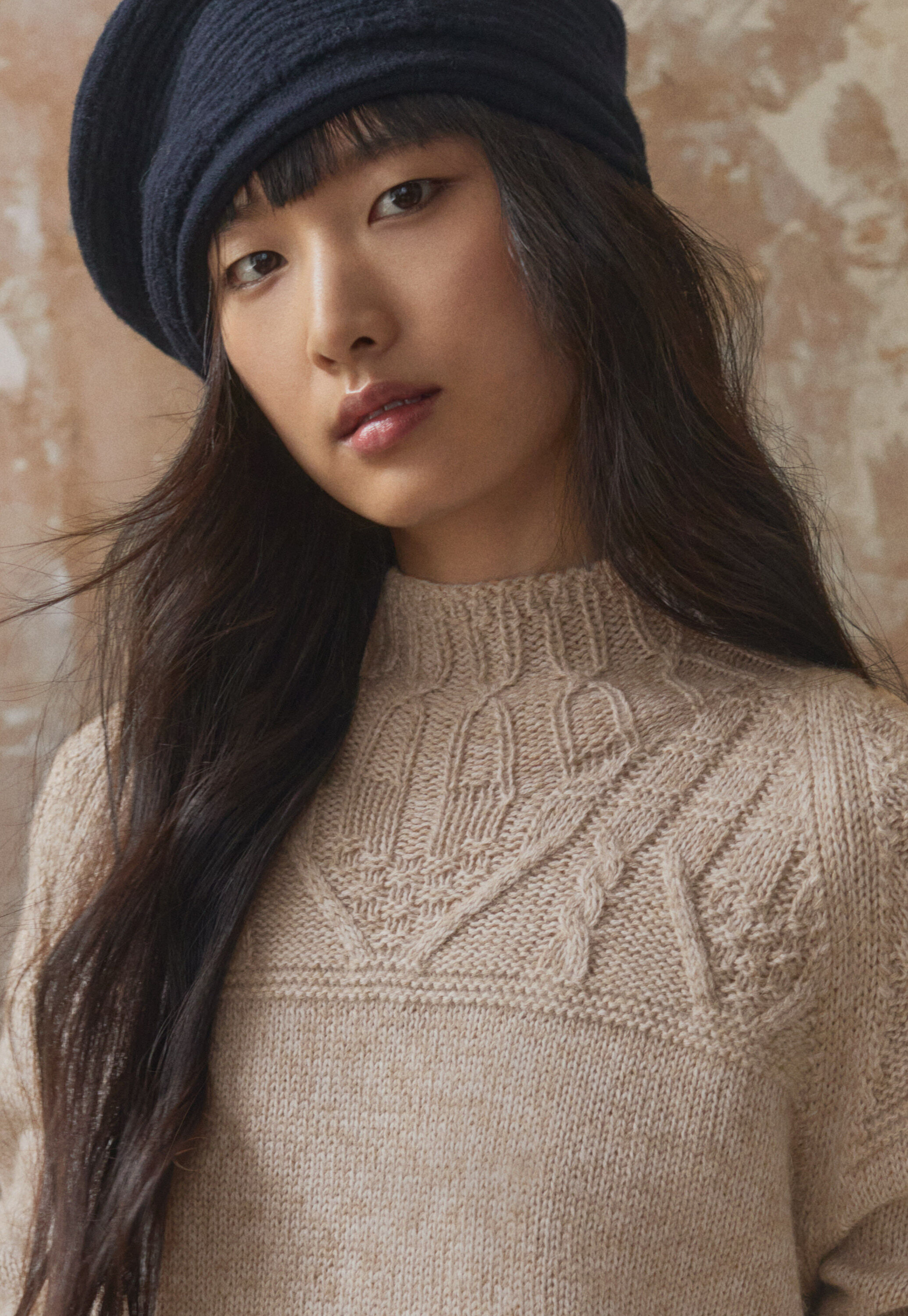 Cable-yoke sweater