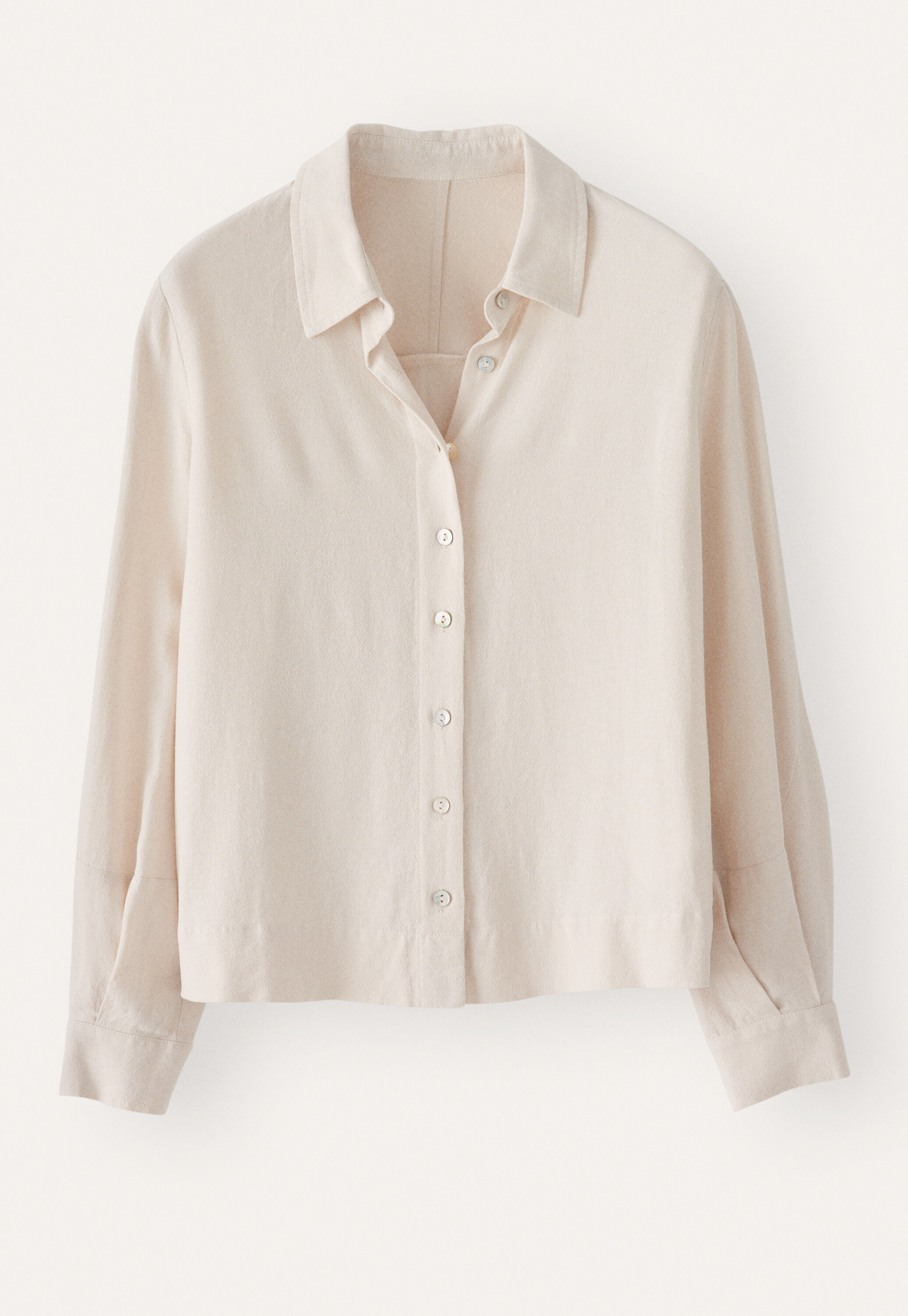 Curved-sleeve blouse