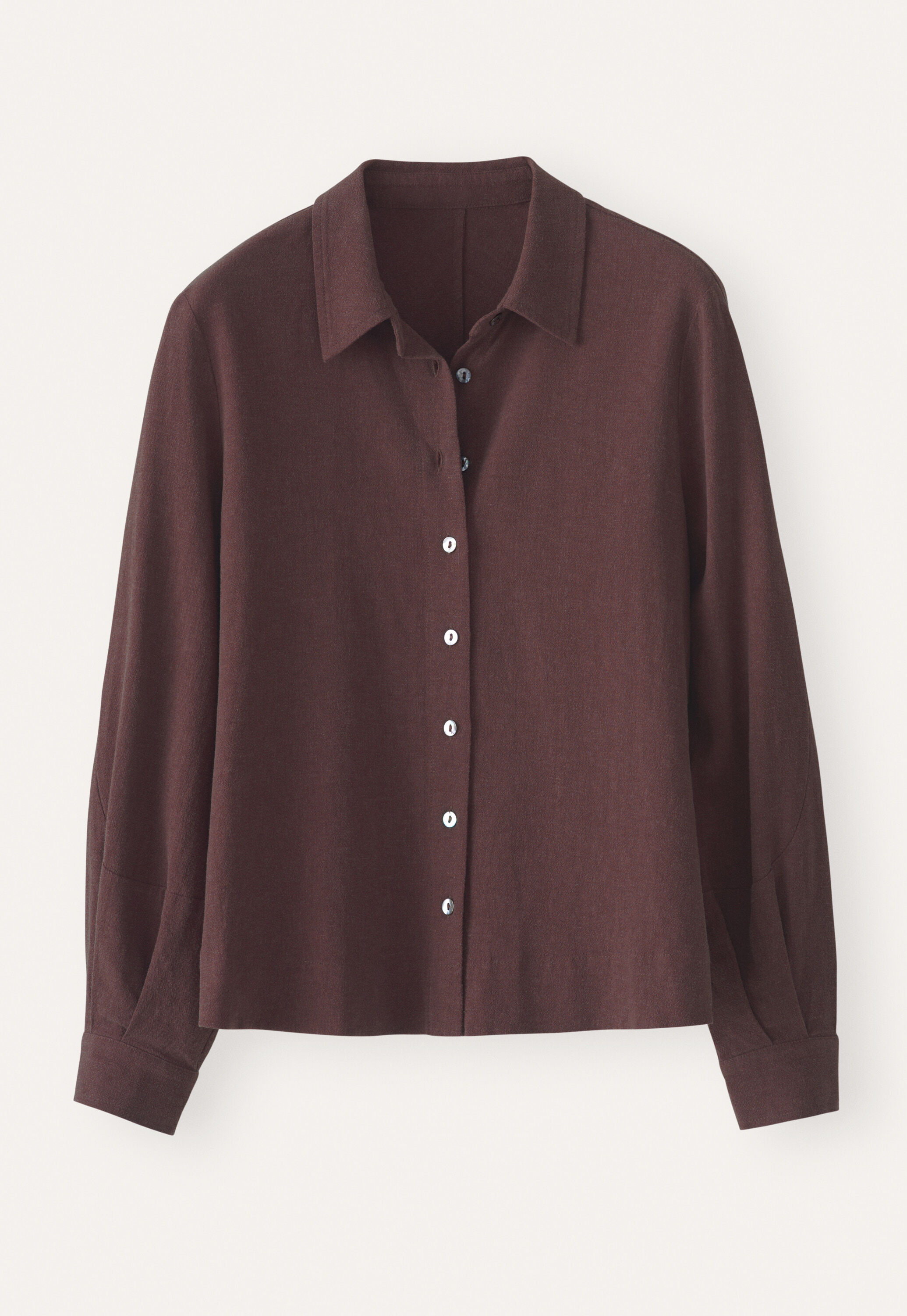 Curved-sleeve blouse