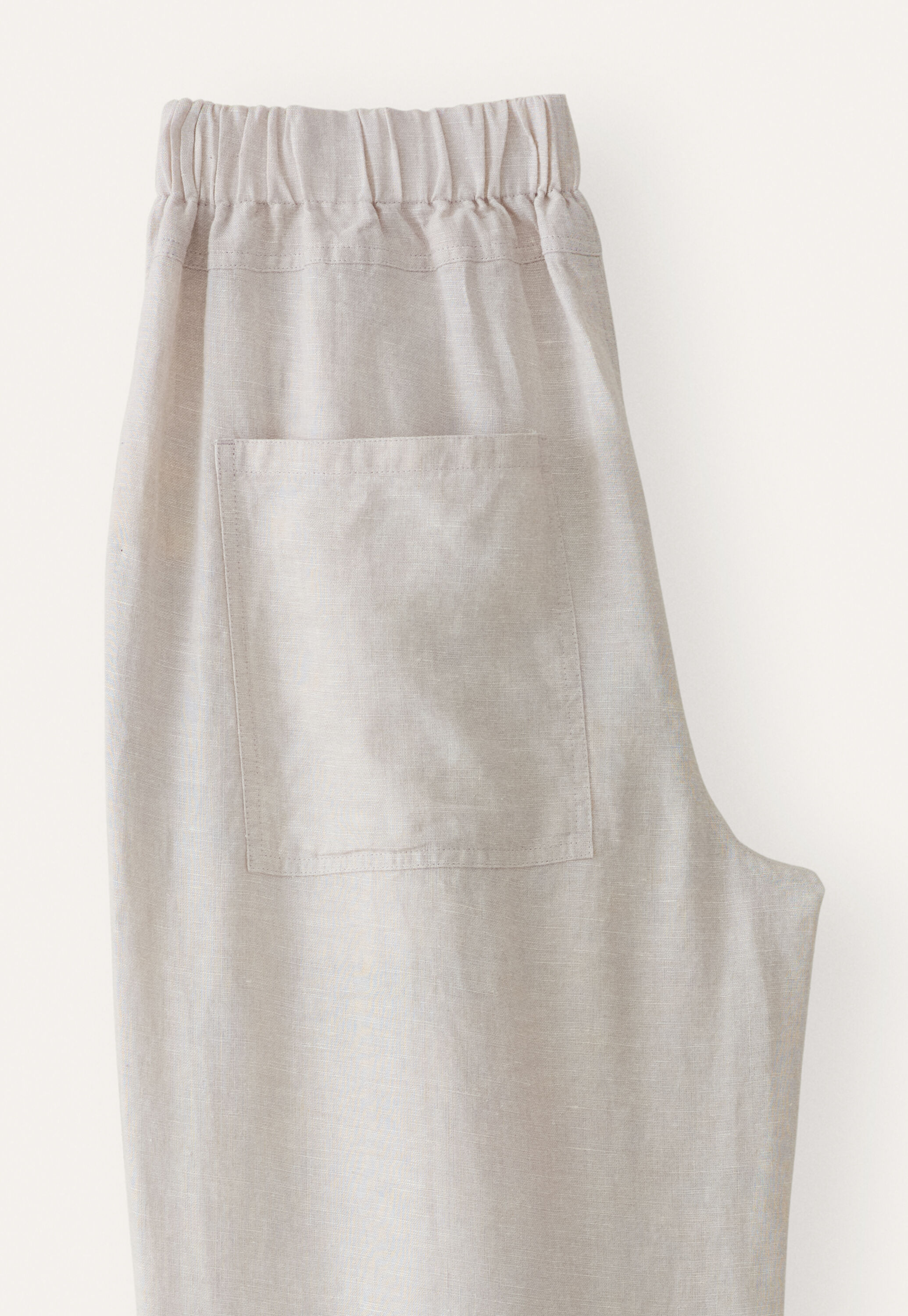Cropped pleated trousers