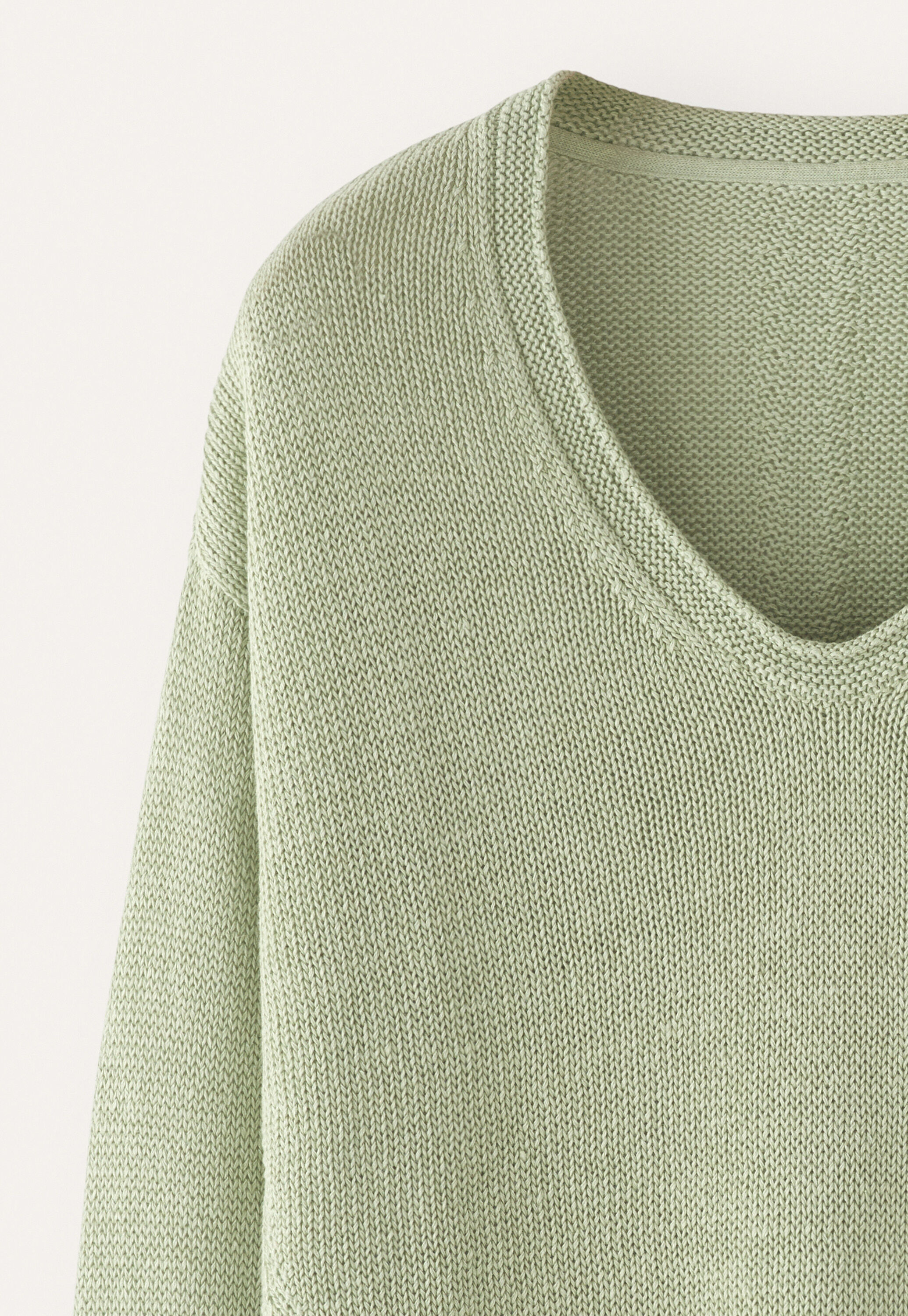 Curved v-neck sweater
