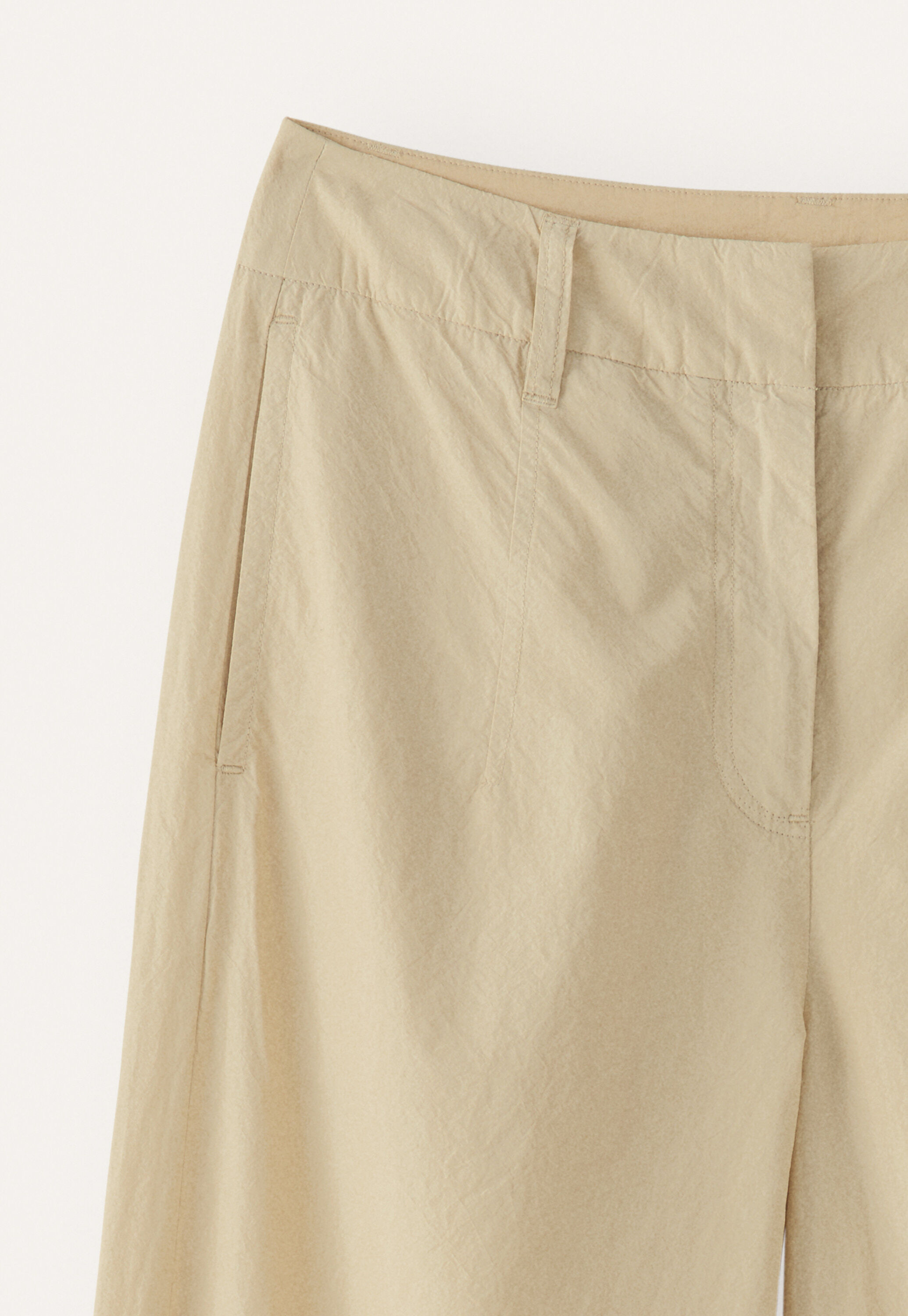 Darted-hem trousers