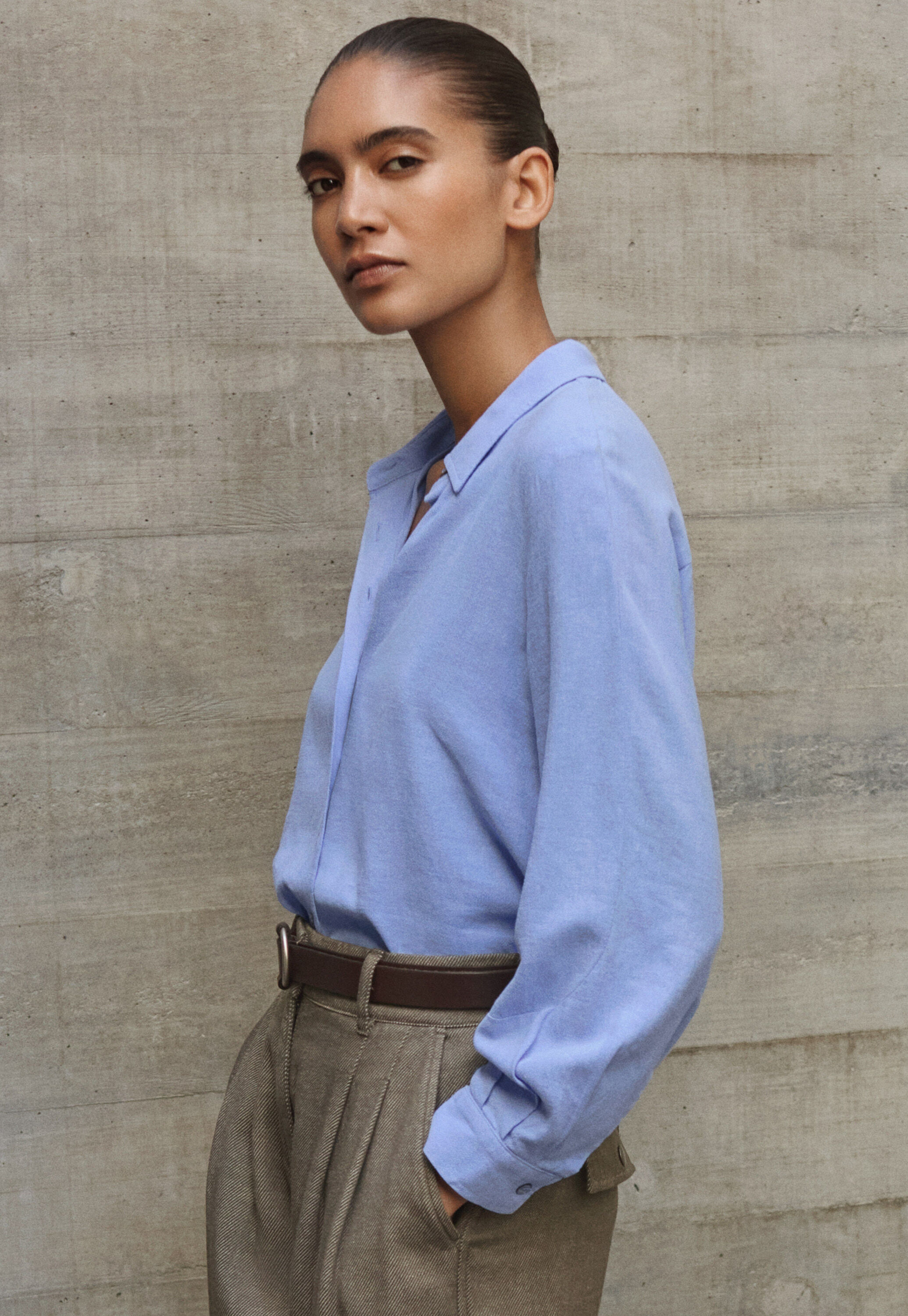 Curved-sleeve blouse
