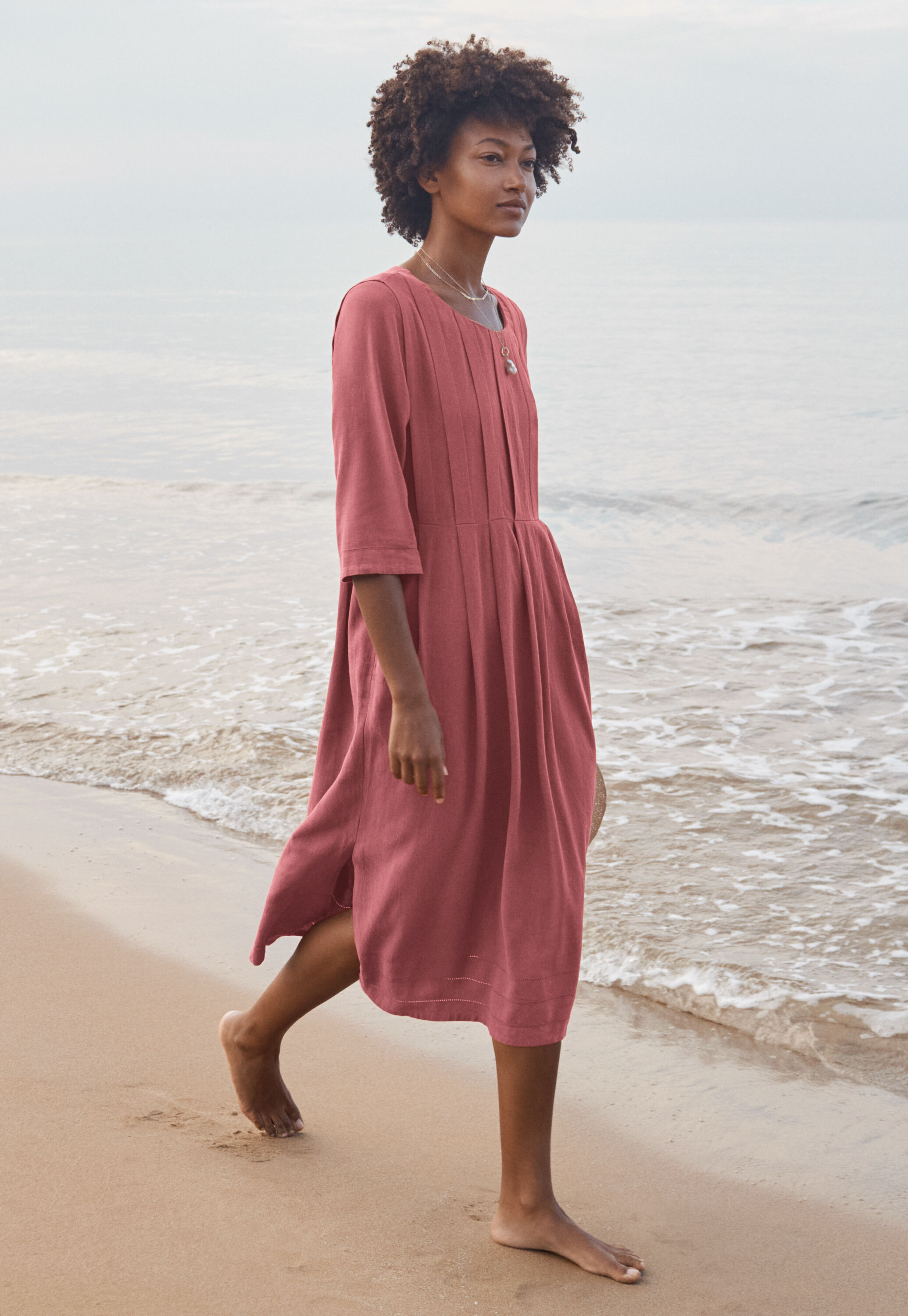 Curved-sleeve blouse