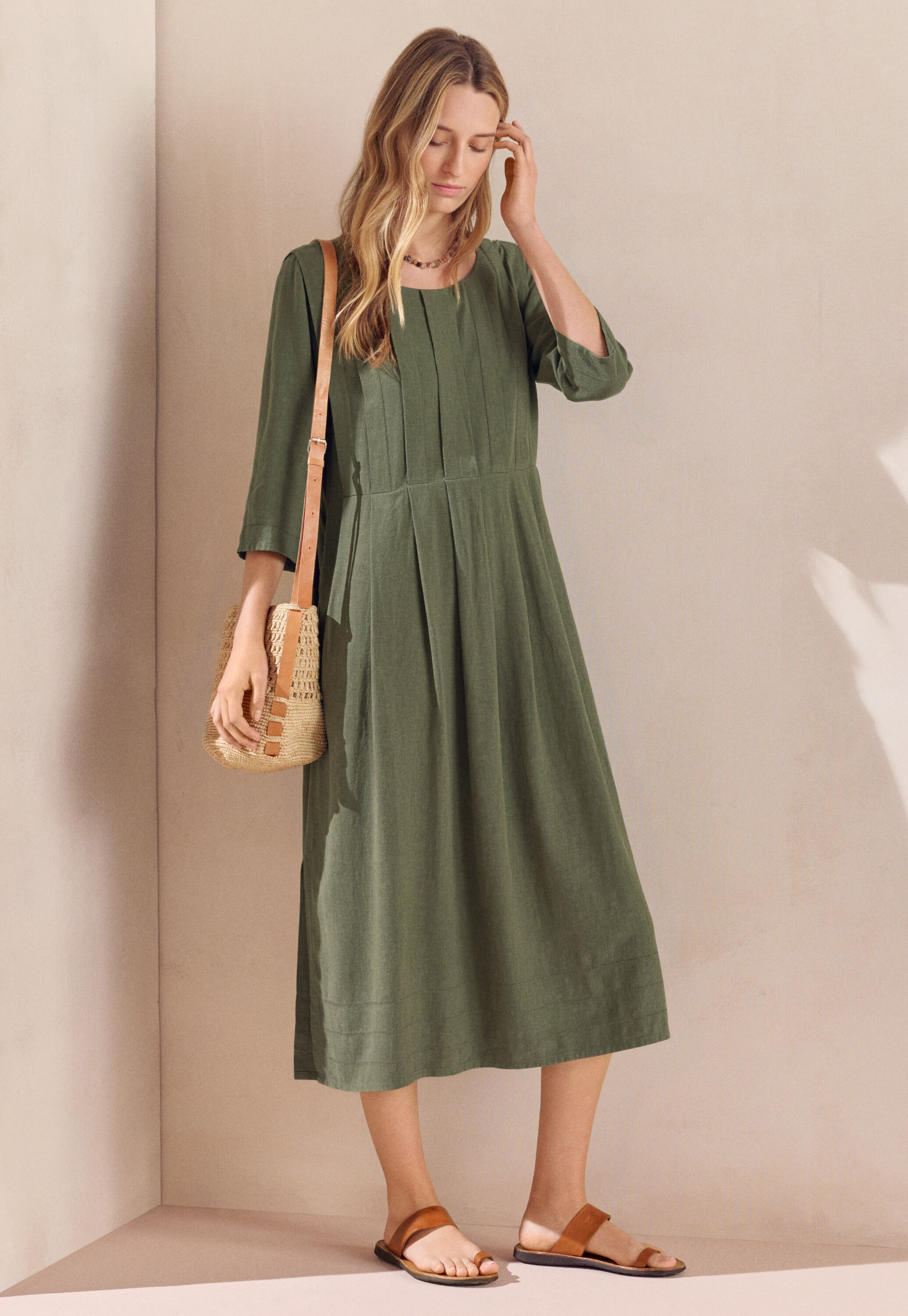 Curved-sleeve blouse